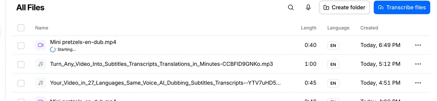 File list with a new file being transcribed and its progress shown